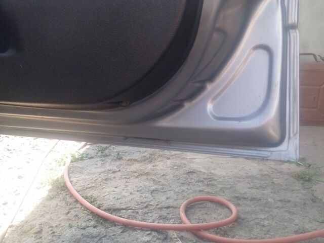 Серый Опель Астра, объемом двигателя 1.4 л и пробегом 230 тыс. км за 2800 $, фото 6 на Automoto.ua