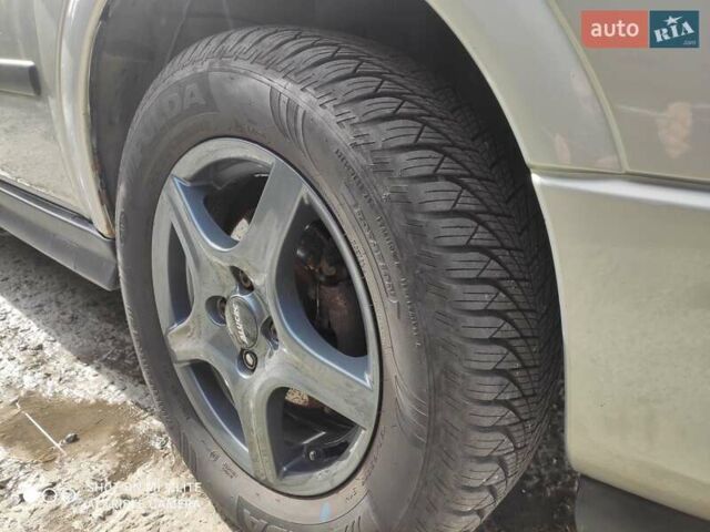 Серый Опель Астра, объемом двигателя 1.4 л и пробегом 216 тыс. км за 3800 $, фото 7 на Automoto.ua