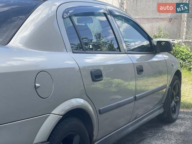 Серый Опель Астра, объемом двигателя 1.4 л и пробегом 172 тыс. км за 3500 $, фото 3 на Automoto.ua