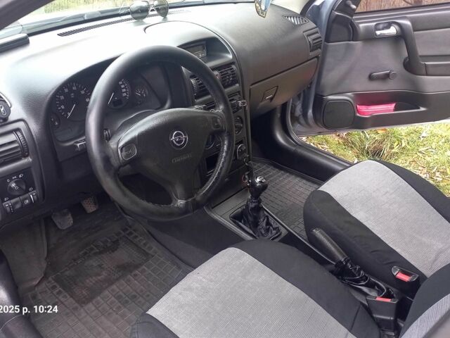 Серый Опель Астра, объемом двигателя 1.4 л и пробегом 212 тыс. км за 4200 $, фото 5 на Automoto.ua