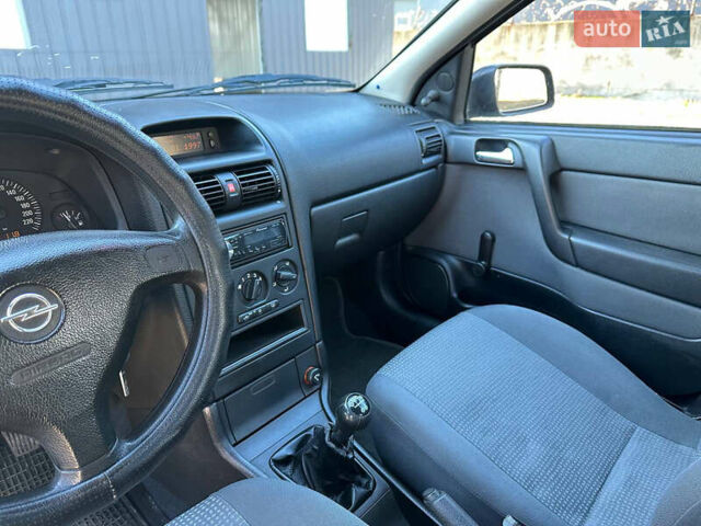 Серый Опель Астра, объемом двигателя 1.4 л и пробегом 116 тыс. км за 4699 $, фото 13 на Automoto.ua