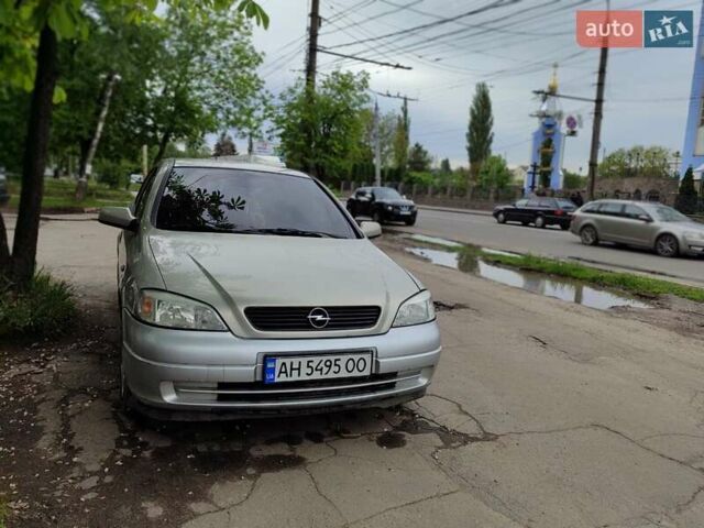 Серый Опель Астра, объемом двигателя 1.4 л и пробегом 210 тыс. км за 3100 $, фото 1 на Automoto.ua