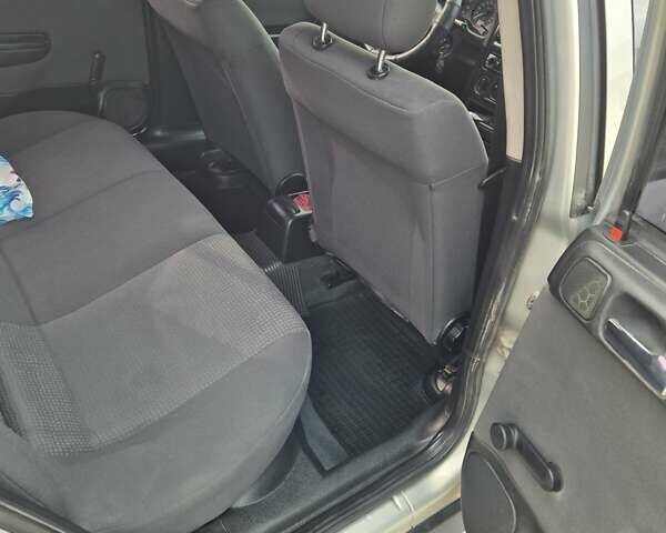 Серый Опель Астра, объемом двигателя 1.4 л и пробегом 361 тыс. км за 3800 $, фото 14 на Automoto.ua