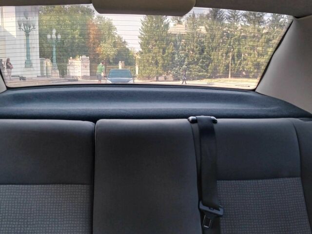 Серый Опель Астра, объемом двигателя 1.4 л и пробегом 260 тыс. км за 3590 $, фото 15 на Automoto.ua