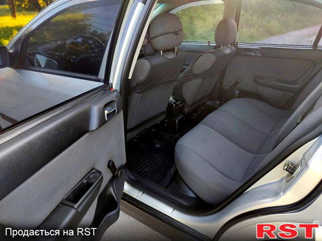 Серый Опель Астра, объемом двигателя 1.4 л и пробегом 198 тыс. км за 3500 $, фото 7 на Automoto.ua