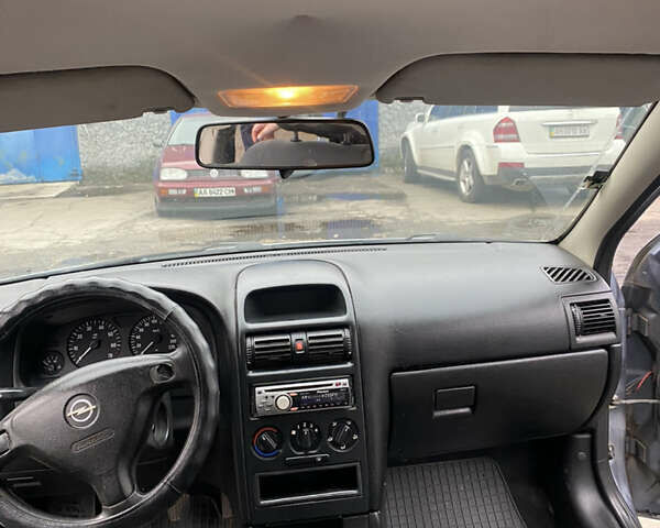 Серый Опель Астра, объемом двигателя 1.4 л и пробегом 283 тыс. км за 3200 $, фото 12 на Automoto.ua