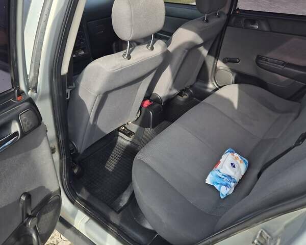 Серый Опель Астра, объемом двигателя 1.4 л и пробегом 361 тыс. км за 3800 $, фото 13 на Automoto.ua