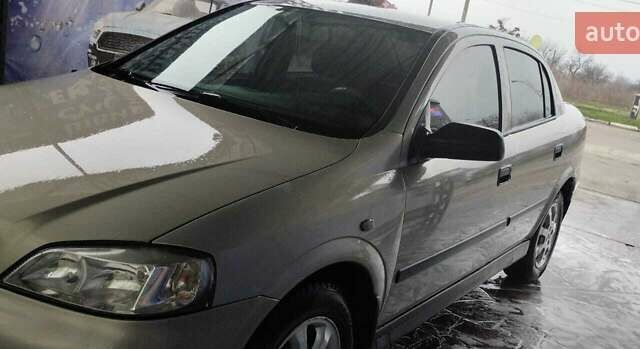 Серый Опель Астра, объемом двигателя 1.36 л и пробегом 362 тыс. км за 3900 $, фото 4 на Automoto.ua