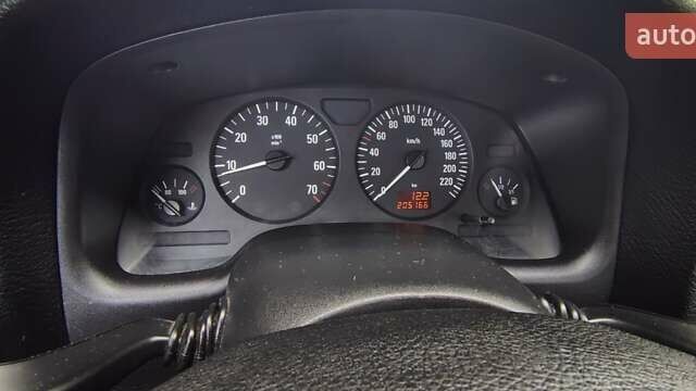 Сірий Опель Астра, об'ємом двигуна 1.4 л та пробігом 205 тис. км за 4840 $, фото 5 на Automoto.ua