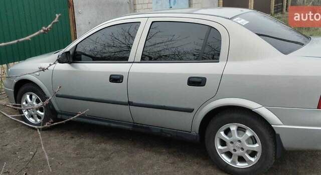 Серый Опель Астра, объемом двигателя 1.36 л и пробегом 362 тыс. км за 3900 $, фото 14 на Automoto.ua