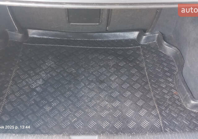 Серый Опель Астра, объемом двигателя 1.4 л и пробегом 212 тыс. км за 3900 $, фото 2 на Automoto.ua