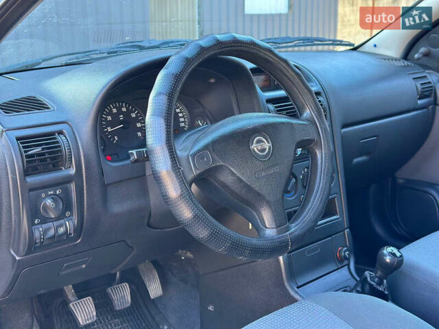 Серый Опель Астра, объемом двигателя 1.4 л и пробегом 116 тыс. км за 4699 $, фото 11 на Automoto.ua