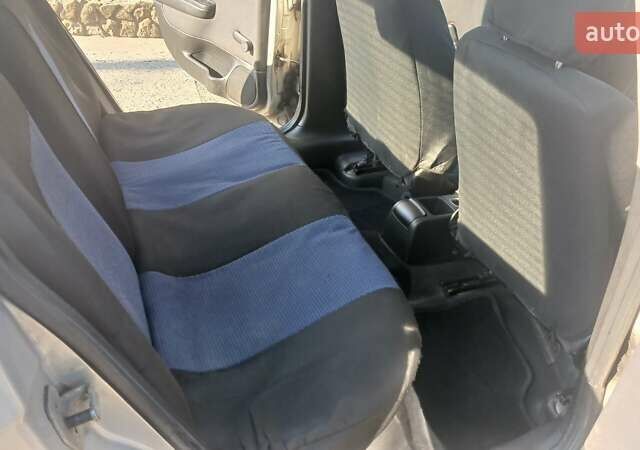 Серый Опель Астра, объемом двигателя 1.4 л и пробегом 400 тыс. км за 2300 $, фото 10 на Automoto.ua