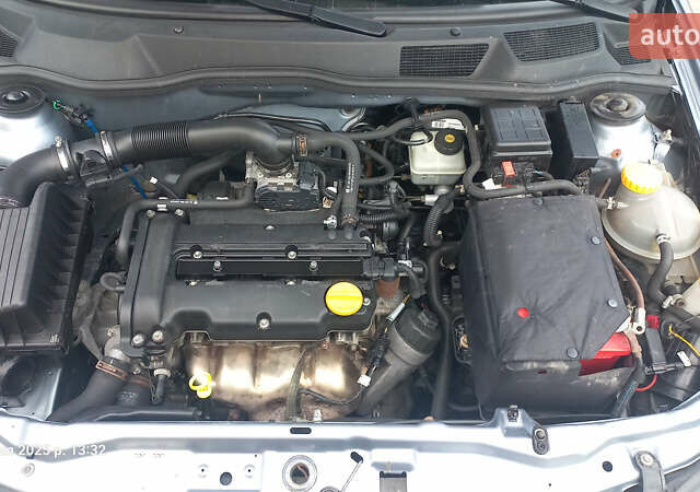 Серый Опель Астра, объемом двигателя 1.4 л и пробегом 212 тыс. км за 3900 $, фото 8 на Automoto.ua