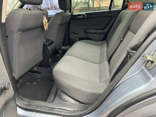 Серый Опель Астра, объемом двигателя 1.4 л и пробегом 185 тыс. км за 4500 $, фото 8 на Automoto.ua