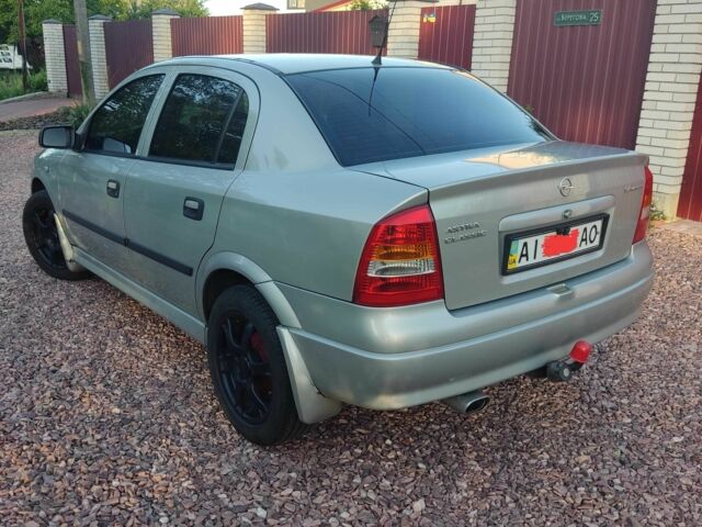 Серый Опель Астра, объемом двигателя 1.4 л и пробегом 338 тыс. км за 4100 $, фото 3 на Automoto.ua