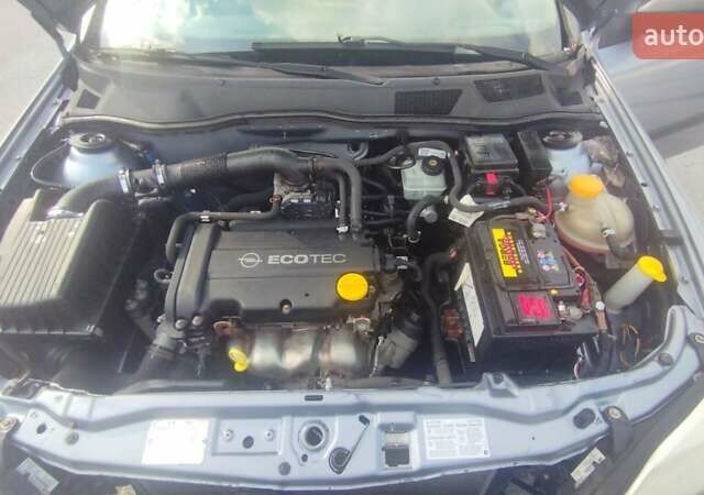 Серый Опель Астра, объемом двигателя 1.39 л и пробегом 145 тыс. км за 3900 $, фото 3 на Automoto.ua