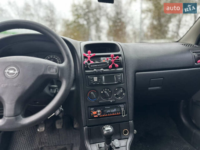 Опель Астра 2006 у Сумах на Automoto.ua Сірий Опель Астра, об'ємом двигуна 1.4 л та пробігом 253 тис. км за 3999 $, фото 11 на Automoto.ua