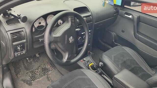 Серый Опель Астра, объемом двигателя 1.4 л и пробегом 156 тыс. км за 4500 $, фото 45 на Automoto.ua