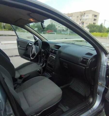 Серый Опель Астра, объемом двигателя 1.39 л и пробегом 145 тыс. км за 3900 $, фото 8 на Automoto.ua