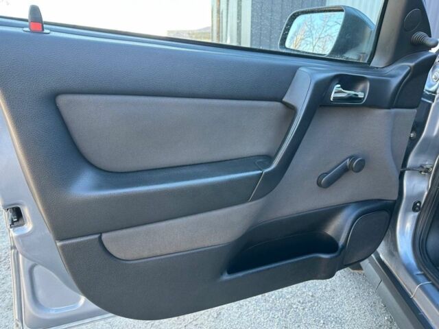 Серый Опель Астра, объемом двигателя 1.4 л и пробегом 116 тыс. км за 4699 $, фото 9 на Automoto.ua