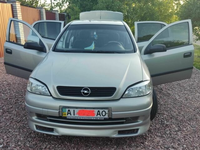 Серый Опель Астра, объемом двигателя 1.4 л и пробегом 338 тыс. км за 4100 $, фото 5 на Automoto.ua