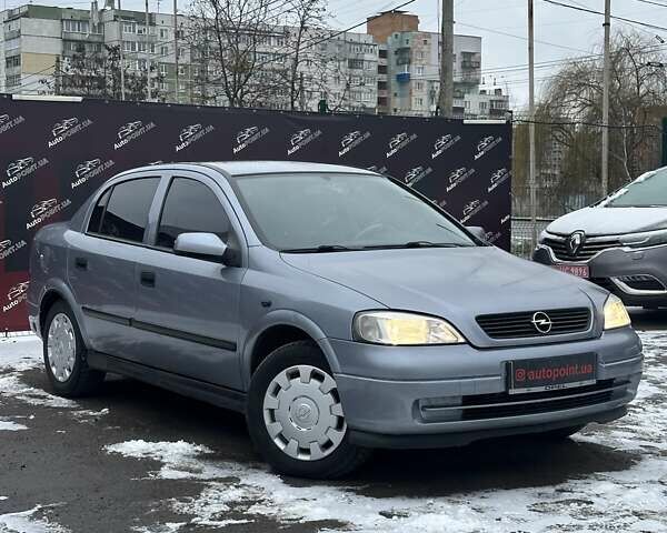 Серый Опель Астра, объемом двигателя 1.36 л и пробегом 186 тыс. км за 4400 $, фото 2 на Automoto.ua