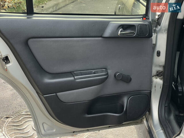 Серый Опель Астра, объемом двигателя 1.36 л и пробегом 77 тыс. км за 3999 $, фото 37 на Automoto.ua