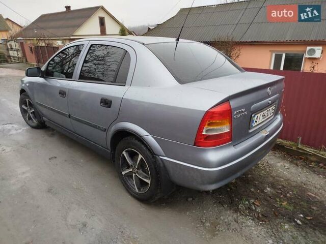 Серый Опель Астра, объемом двигателя 1.4 л и пробегом 197 тыс. км за 3350 $, фото 3 на Automoto.ua