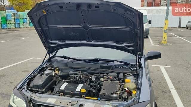 Серый Опель Астра, объемом двигателя 1.4 л и пробегом 156 тыс. км за 4500 $, фото 54 на Automoto.ua