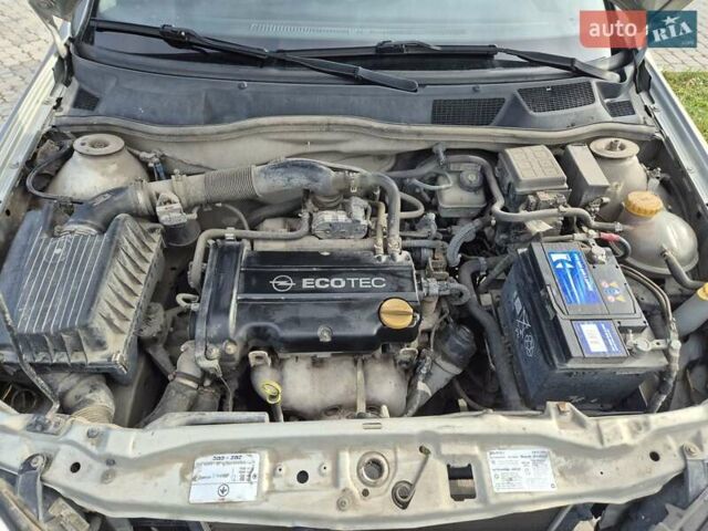 Серый Опель Астра, объемом двигателя 1.4 л и пробегом 361 тыс. км за 3800 $, фото 18 на Automoto.ua