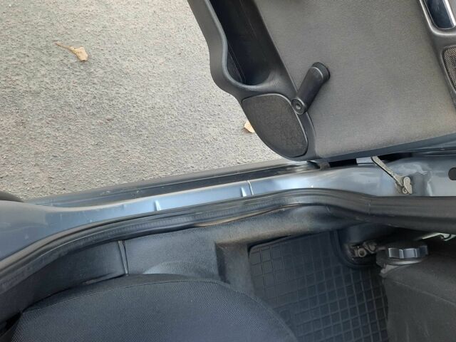 Серый Опель Астра, объемом двигателя 1.4 л и пробегом 282 тыс. км за 3700 $, фото 9 на Automoto.ua