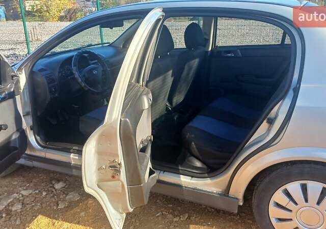 Серый Опель Астра, объемом двигателя 1.4 л и пробегом 400 тыс. км за 2300 $, фото 6 на Automoto.ua