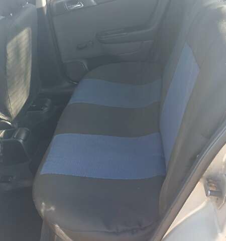 Серый Опель Астра, объемом двигателя 1.4 л и пробегом 400 тыс. км за 2300 $, фото 4 на Automoto.ua