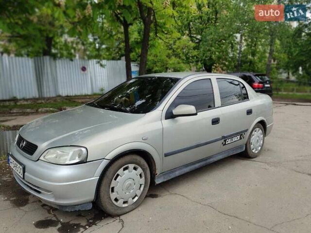 Серый Опель Астра, объемом двигателя 1.4 л и пробегом 210 тыс. км за 3100 $, фото 5 на Automoto.ua