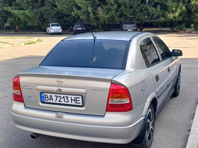 Серый Опель Астра, объемом двигателя 1.4 л и пробегом 260 тыс. км за 3590 $, фото 4 на Automoto.ua