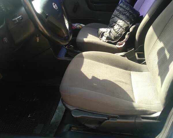 Серый Опель Астра, объемом двигателя 1.4 л и пробегом 278 тыс. км за 4000 $, фото 9 на Automoto.ua