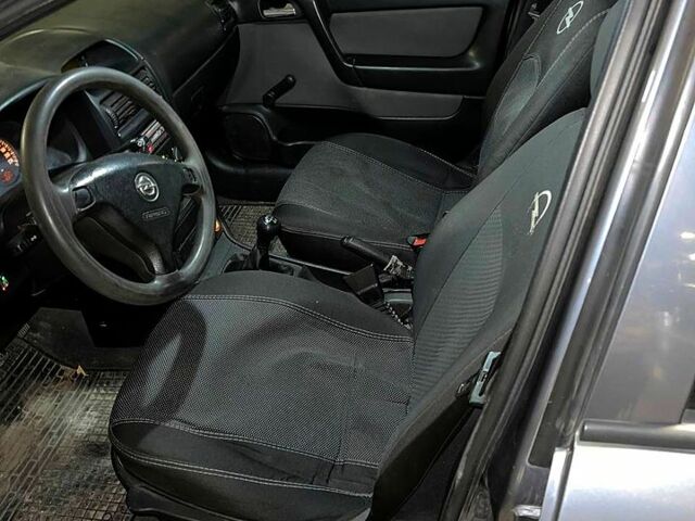 Серый Опель Астра, объемом двигателя 1.4 л и пробегом 263 тыс. км за 2700 $, фото 2 на Automoto.ua