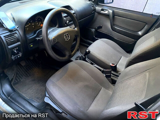 Серый Опель Астра, объемом двигателя 1.4 л и пробегом 200 тыс. км за 3500 $, фото 7 на Automoto.ua