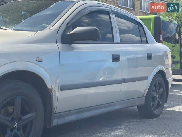 Серый Опель Астра, объемом двигателя 1.4 л и пробегом 172 тыс. км за 3500 $, фото 1 на Automoto.ua