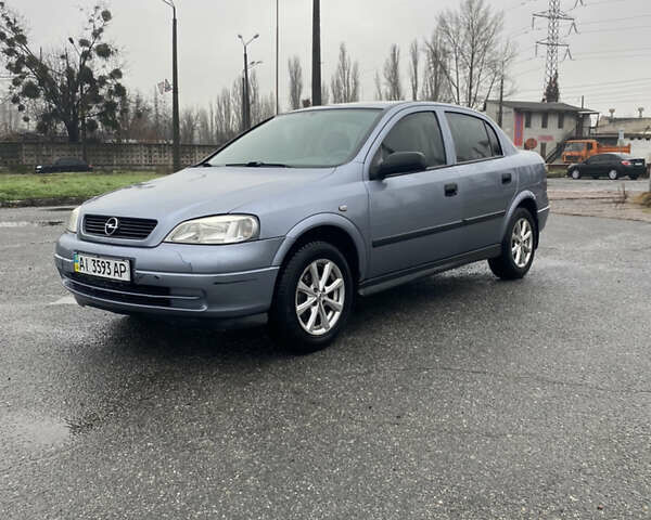 Серый Опель Астра, объемом двигателя 1.4 л и пробегом 283 тыс. км за 3200 $, фото 4 на Automoto.ua