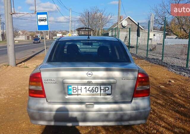 Серый Опель Астра, объемом двигателя 1.4 л и пробегом 400 тыс. км за 2300 $, фото 2 на Automoto.ua
