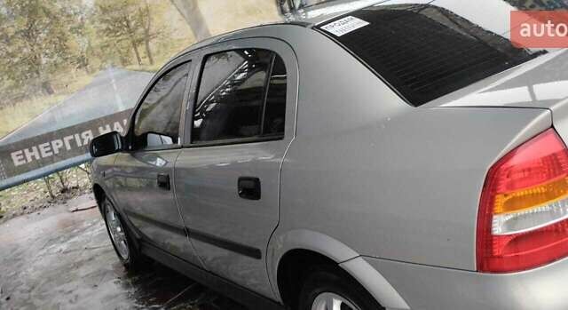 Серый Опель Астра, объемом двигателя 1.36 л и пробегом 362 тыс. км за 3900 $, фото 3 на Automoto.ua
