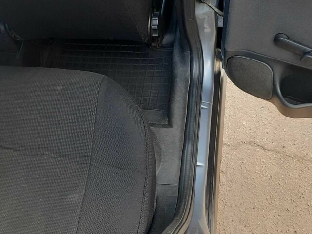 Серый Опель Астра, объемом двигателя 1.4 л и пробегом 282 тыс. км за 3700 $, фото 7 на Automoto.ua