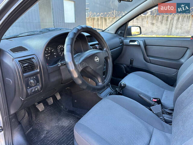 Серый Опель Астра, объемом двигателя 1.4 л и пробегом 116 тыс. км за 4699 $, фото 10 на Automoto.ua