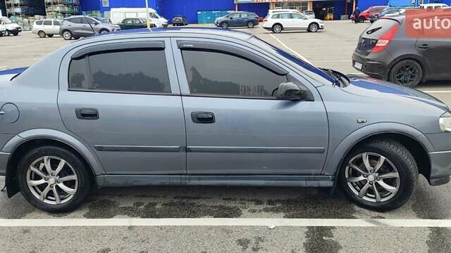 Серый Опель Астра, объемом двигателя 1.4 л и пробегом 156 тыс. км за 4500 $, фото 12 на Automoto.ua