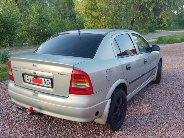 Серый Опель Астра, объемом двигателя 1.4 л и пробегом 338 тыс. км за 4100 $, фото 4 на Automoto.ua