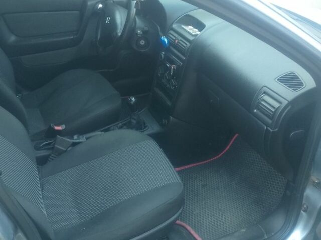 Серый Опель Астра, объемом двигателя 1.4 л и пробегом 230 тыс. км за 2800 $, фото 1 на Automoto.ua