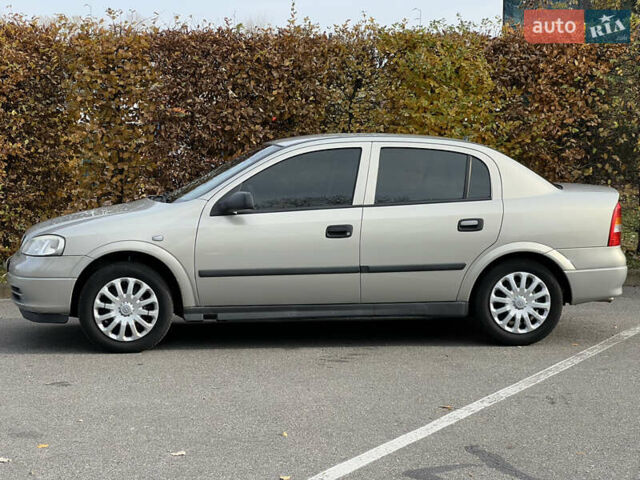 Серый Опель Астра, объемом двигателя 1.36 л и пробегом 77 тыс. км за 3999 $, фото 10 на Automoto.ua