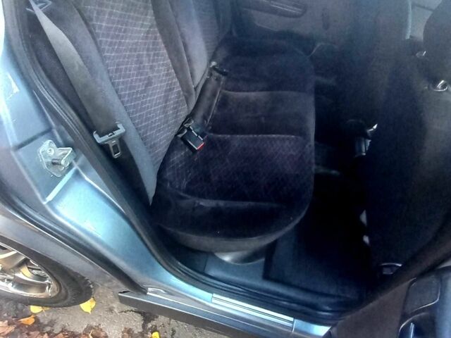 Серый Опель Астра, объемом двигателя 1.4 л и пробегом 212 тыс. км за 4200 $, фото 11 на Automoto.ua